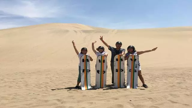 Buggy And Sandboard In The Desert