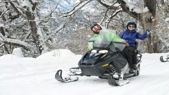 Fondue And Snowmobiles At Sunset In Cerro Catedral